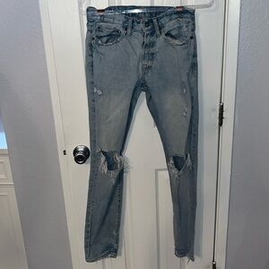 American 🦅 Eagle distressed light blue jeans